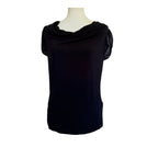 Black sleeveless top on a mannequin against a white background